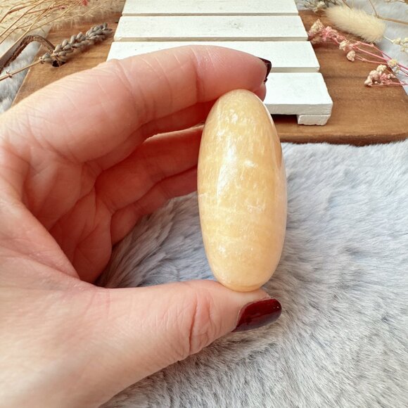 Beautiful Orange Calcite Palm Stone - Picture 3 of 6